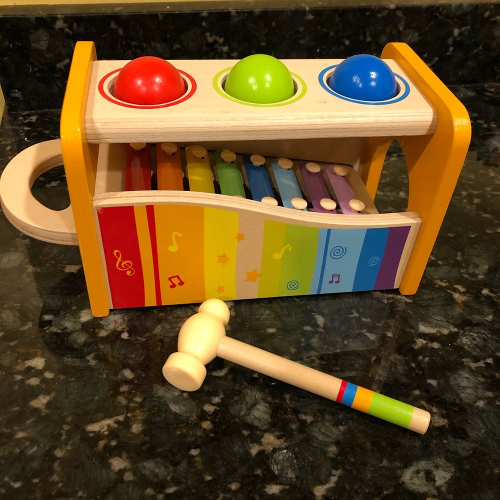 Pound & tap bench with pull out xylophone
